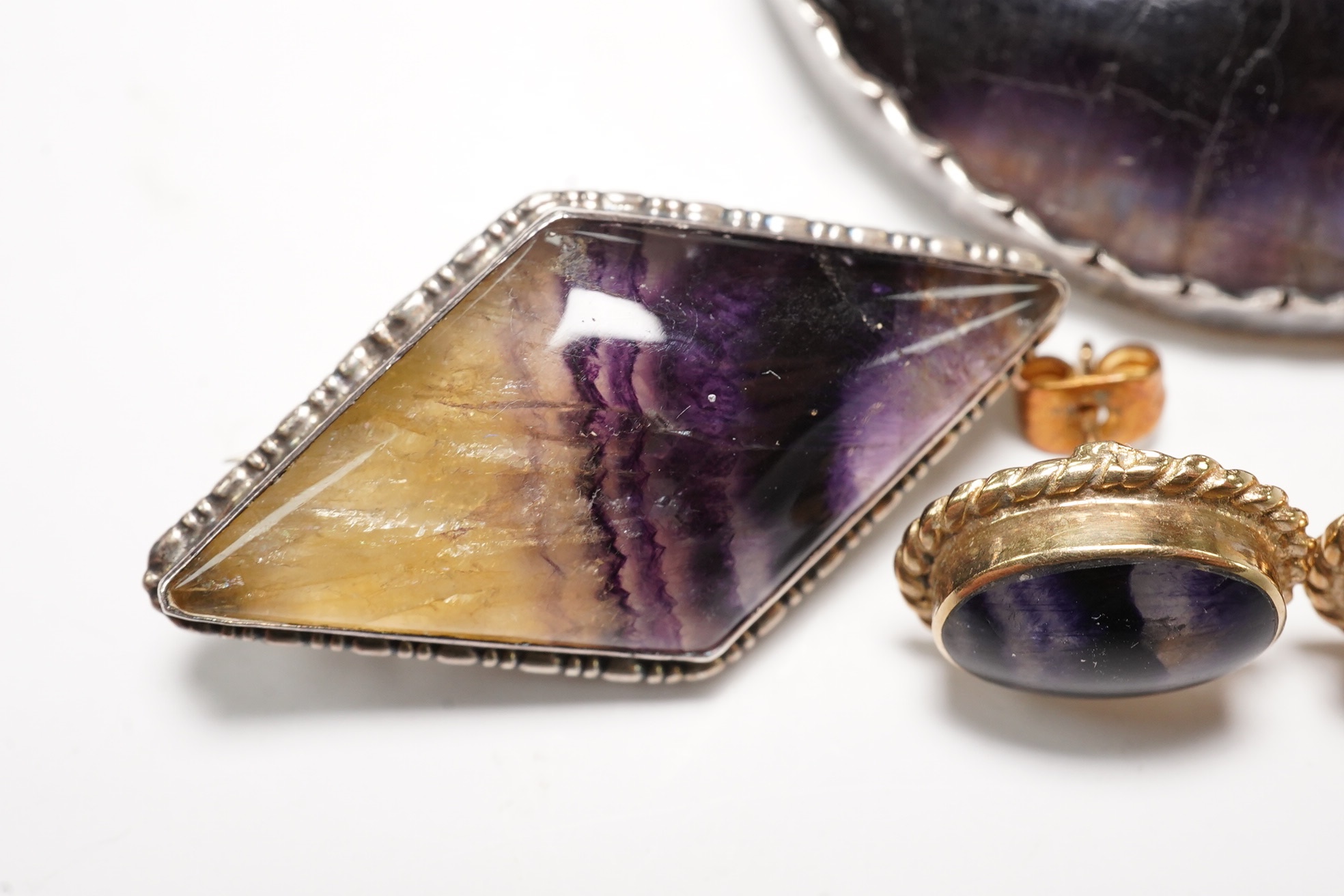 Four items of Blue John set jewellery including a pair of 9ct earrings and a 9ct ring. Condition - poor to fair